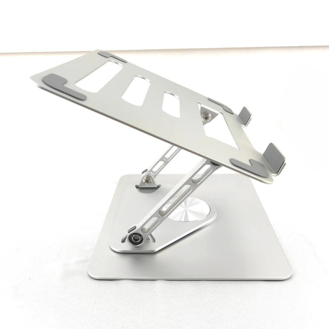 Adjustable Aluminum Laptop Stand – 360° Rotating Base for 14–17.3" Laptops
