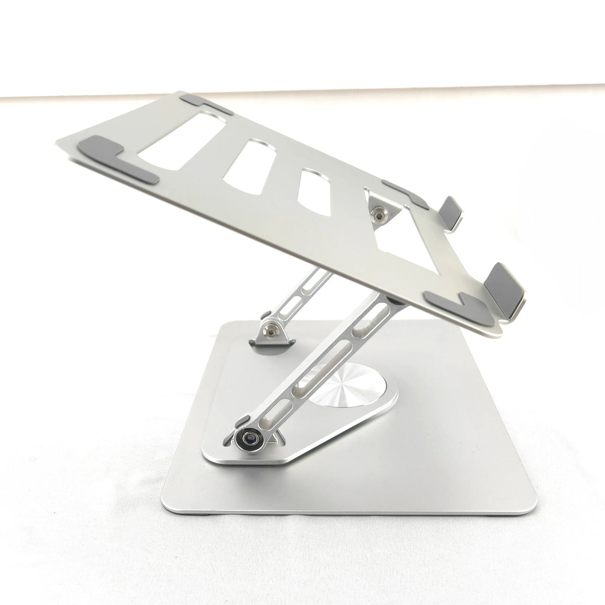 Adjustable Aluminum Laptop Stand – 360° Rotating Base for 14–17.3" Laptops